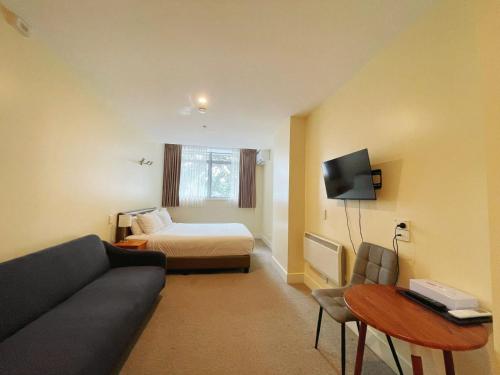 TV a/nebo společenská místnost v ubytování Grand Central Serviced Apartments