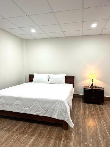 Kim Hotel Vincom Tây Ninhにあるベッド
