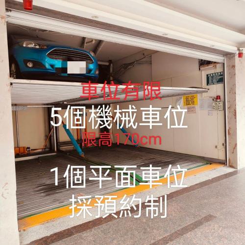 a garage with a car inside of it at Fooyee Hotel - Yonghe in Yonghe