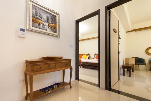 Hualien Professor's Home B&B No. 2198にあるベッド