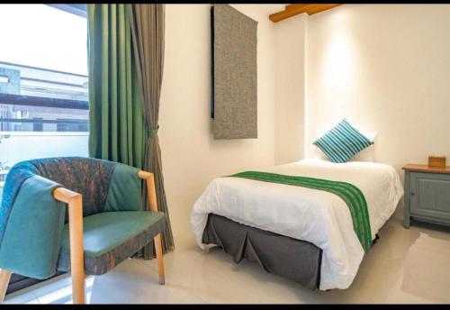 Hualien Professor's Home B&B No. 2198にあるベッド