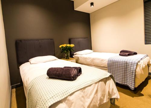 En eller flere senge i et værelse på Casa del Mar