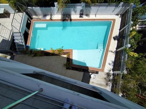 an overhead view of a swimming pool on a house at Island Horizon Villas in Grand Baie