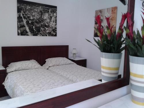 Postel nebo postele na pokoji v ubytování Stegadi Apartments Sikinos