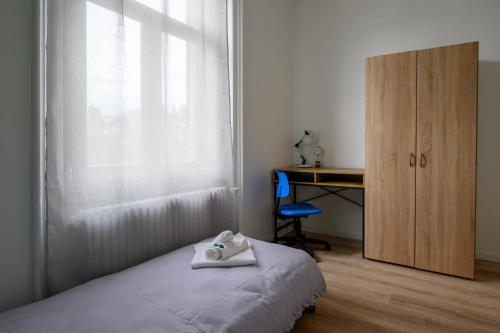Ένα ή περισσότερα κρεβάτια σε δωμάτιο στο Gruben Apartments 3 Schlafzimmer