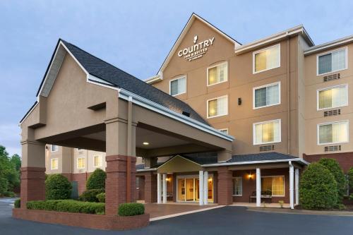 a rendering of the front of a hotel at Country Inn & Suites by Radisson, Buford at Mall of Georgia, GA in Buford