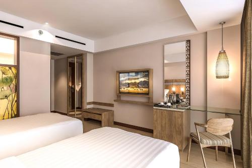 Ένα ή περισσότερα κρεβάτια σε δωμάτιο στο Fairfield by Marriott Bali Legian