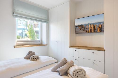 Giường trong phòng chung tại Deichlodge-1