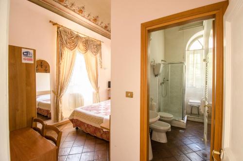 Koupelna v ubytování Hotel Iris