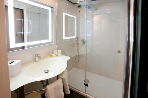 Ванная комната в Palace Hotel Legnano