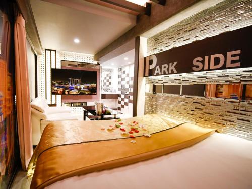 Katil atau katil-katil dalam bilik di HOTEL PARK SIDE