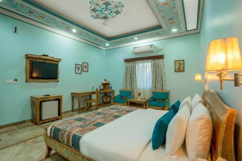 Postel nebo postele na pokoji v ubytování Marugarh Resort and Spa