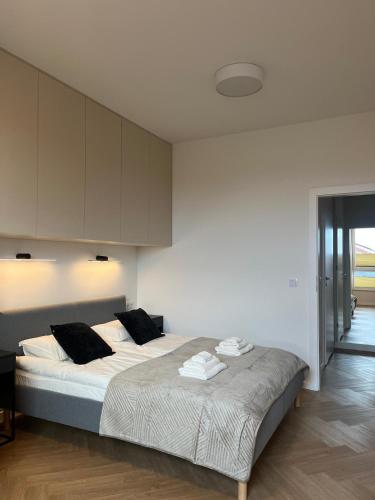 Postel nebo postele na pokoji v ubytování Apartament N13
