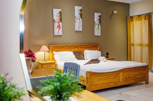 Voodi või voodid majutusasutuse Ocean Villa Heights toas