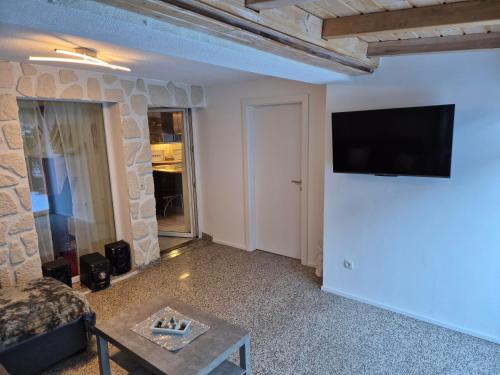 Ferienhaus Alfenzにあるテレビまたはエンターテインメントセンター