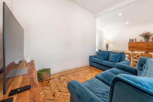 TV a/nebo společenská místnost v ubytování Casa dos Cucos