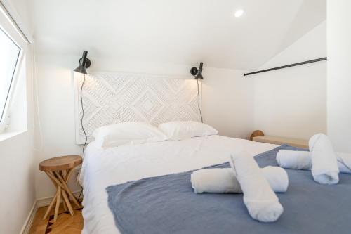 Postel nebo postele na pokoji v ubytování Casa dos Cucos