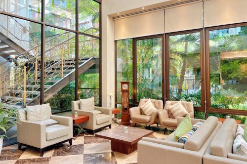 Гостиная зона в Balcony Courtyard Sriracha Hotel & Serviced Apartments