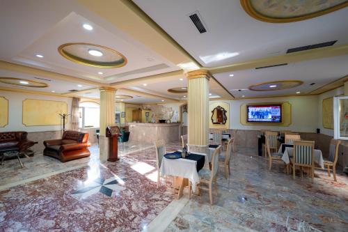 Μια τηλεόραση ή/και κέντρο ψυχαγωγίας στο Olimpic Hotel