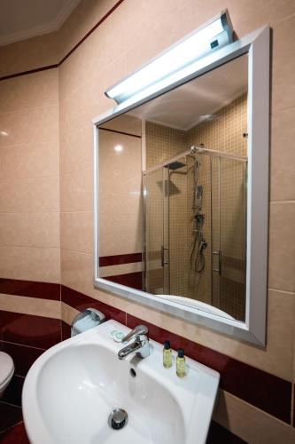 Koupelna v ubytování Hotel Aria