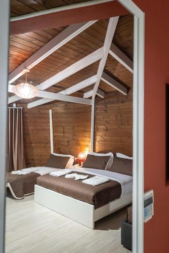 Postel nebo postele na pokoji v ubytování Hotel Aria