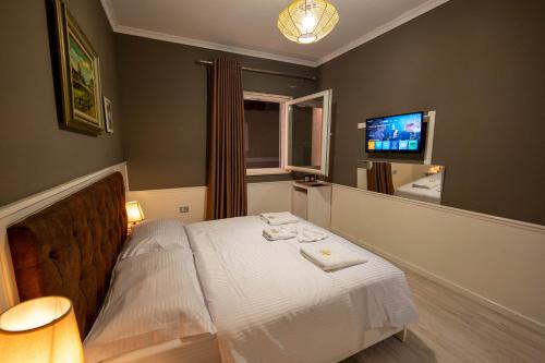Postel nebo postele na pokoji v ubytování Hotel Aria