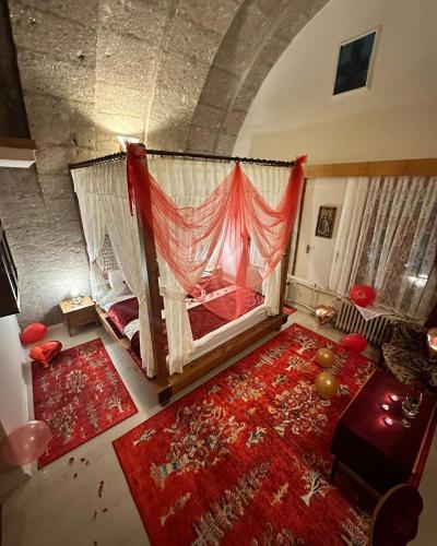 an overhead view of a living room with a bed at Karballa Hotel in Aksaray