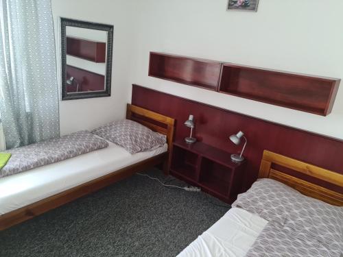 Postel nebo postele na pokoji v ubytování Motel Tošanovice