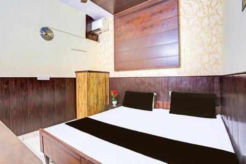 Ένα ή περισσότερα κρεβάτια σε δωμάτιο στο Hotel O cozy suits