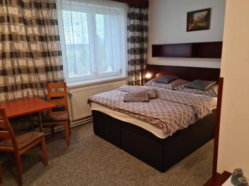 Voodi või voodid majutusasutuse Motel Tošanovice toas