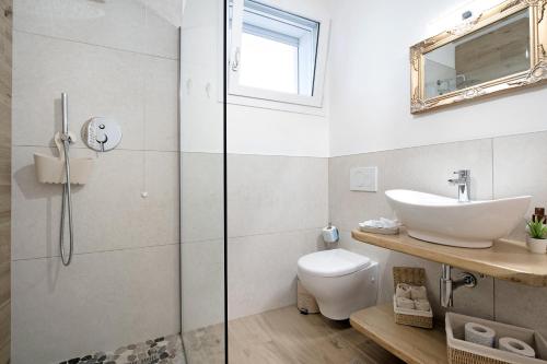 Bilik mandi di Residence Blumar Jesolo Golf Club