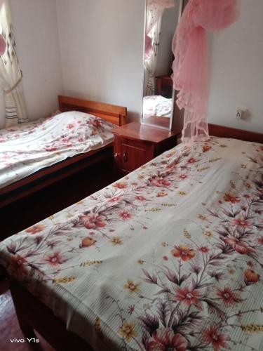 A bed or beds in a room at Sapugolla Family Resort