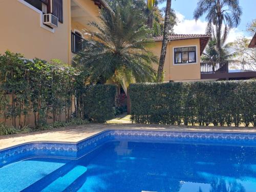 Der Swimmingpool an oder in der Nähe von Pousada Astro Rei Paraty