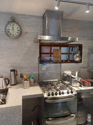 Dapur atau dapur kecil di Chalé Como na Nossa Casa