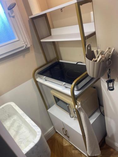 Letto o letti in una camera di Un piccolo rifugio d’élite