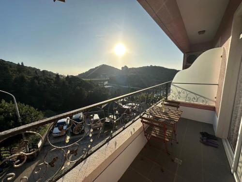 a balcony with a view of a mountain at Bei Ao Bi Shan Jyu in Dongyin