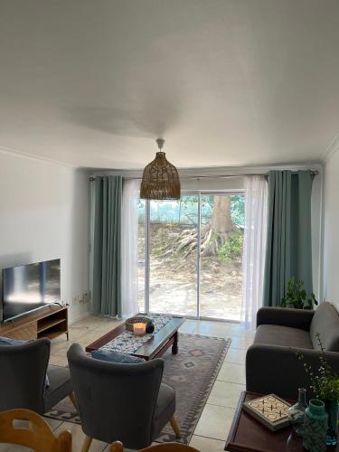 Φωτογραφία από το άλμπουμ του Pinelands Self Catering Apartment στο Κέιπ Τάουν