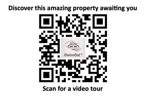 discover this amazing property waiving you scan for a video tour text screenshot at SwissHut Stunning Views Alps Lake - Apart. Herzog 24 in Sigriswil