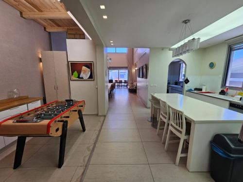 Posezení v ubytování Superbe Villa Spacieuse Tout confort avec Piscine et Jacuzzi