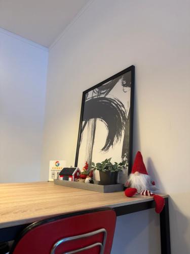 a shelf with a santa hat on top of it at Sentrumsvegen - Private Studio Apartment in Gol in Gol