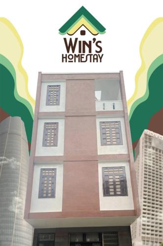 a building with a sign on top of it at Win's Homestay in Danang