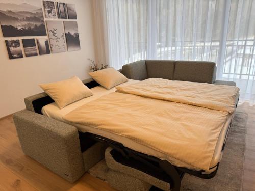 Postel nebo postele na pokoji v ubytování Brezovina Apartments Oravské Veselé - ORAVA