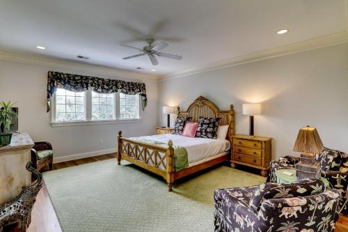 a bedroom with a bed and a ceiling fan at GE317: 317 Glen Eagle in Kiawah Island