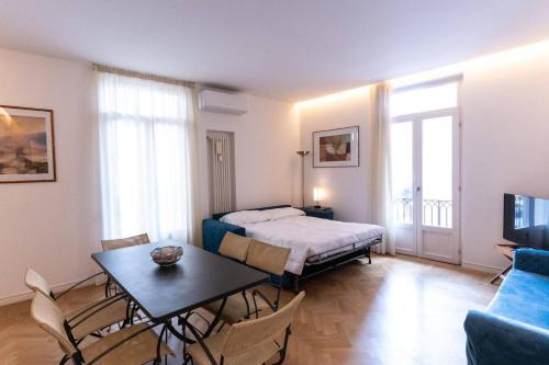 Ένα ή περισσότερα κρεβάτια σε δωμάτιο στο VeronaVera Anfiteatro