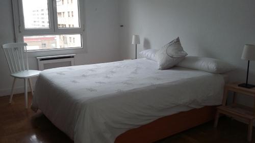 A bed or beds in a room at Apartamento Vuelta del Castillo