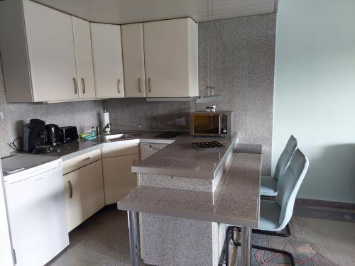 Kuchyň nebo kuchyňský kout v ubytování Ferienwohnung Sander mit Innenpool