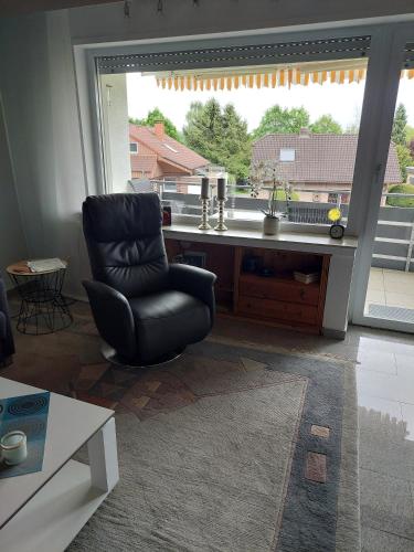 Posezení v ubytování Ferienwohnung Sander mit Innenpool
