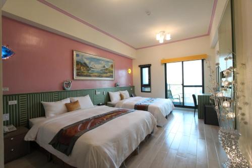 Postel nebo postele na pokoji v ubytování Emilia Resort I
