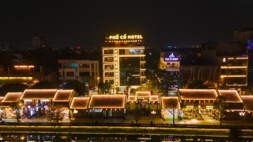 a view of a city at night with lights at Khách sạn Phố cổ Hotel Ninh Bình in Ninh Binh