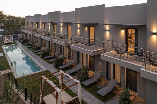an aerial view of a building with a swimming pool at NEK Suites - Adults Only in Chania Town